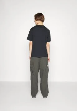 Converse Go To Clouds Graphic - Print T-Shirt - Black -Converse Store 832c0324e98f466b92bd6c569302bf7f