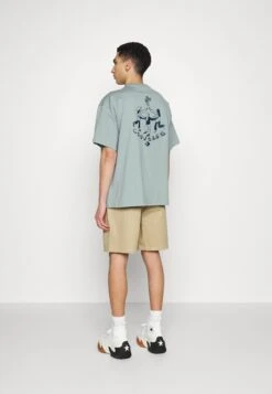 Converse Pocket Baggy - Shorts - Khaki -Converse Store 99a4fd19d1c0436aa2d2b49688353060