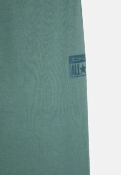Converse Relaxed Fit - Tracksuit Bottoms - Jade Unity -Converse Store e261c430768d4a5f972140ae72a4e30e